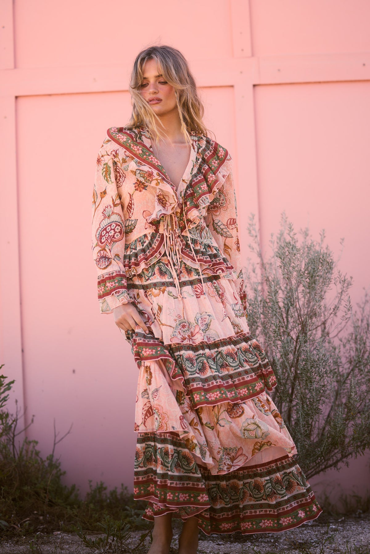 Carmen Frill Top in wildflower oasis with a front tie closure.