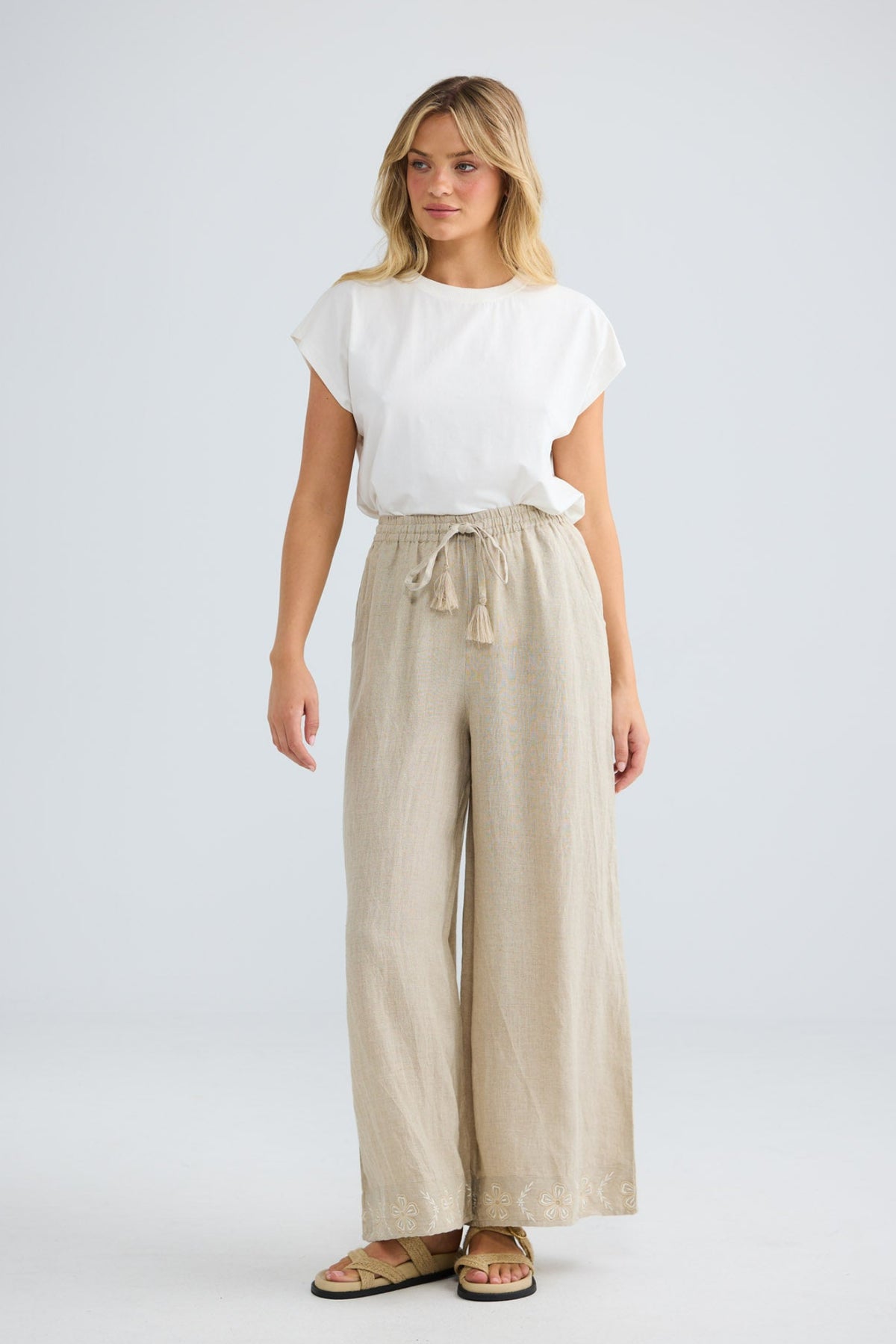 Kitri Pant in oat, three-quarter front view showing the relaxed leg.